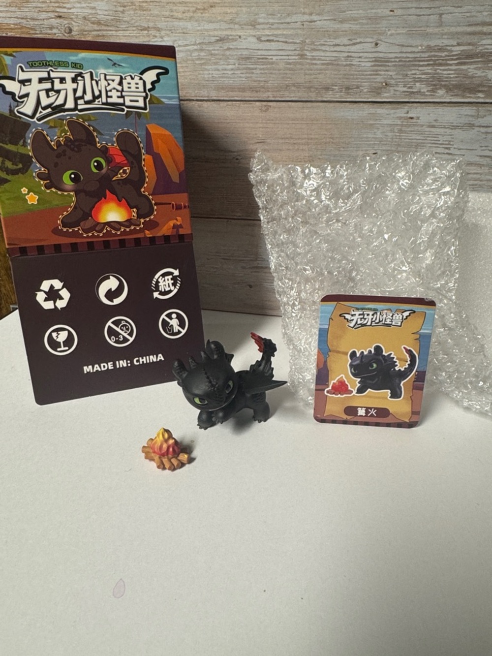 Toothless little monster bonfire figurine